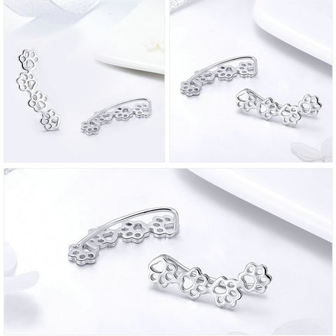 Image of Sterling Silver Pet Paw Print Earrings - Rosecolor