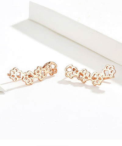Image of Sterling Silver Pet Paw Print Earrings - Rosecolor