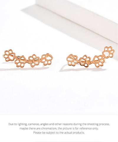 Image of Sterling Silver Pet Paw Print Earrings - Rosecolor