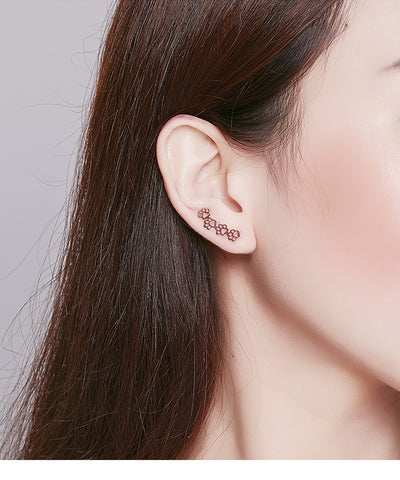 Image of Sterling Silver Pet Paw Print Earrings - Rosecolor