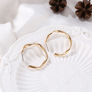 Distortion Gold Round Earrings