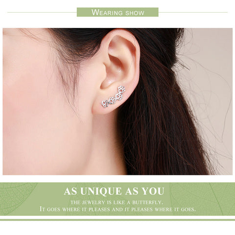 Image of Sterling Silver Pet Paw Print Earrings - Rosecolor