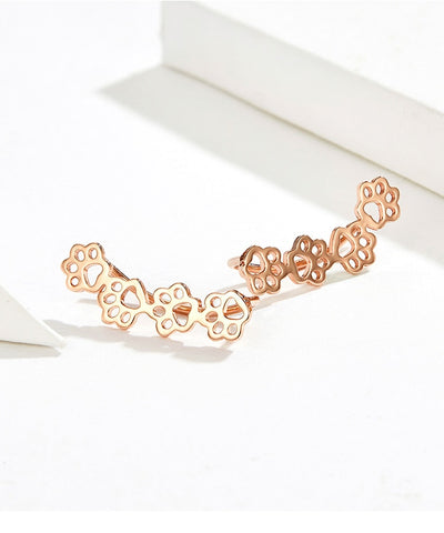Image of Sterling Silver Pet Paw Print Earrings - Rosecolor