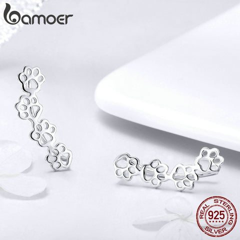Image of Sterling Silver Pet Paw Print Earrings - Rosecolor
